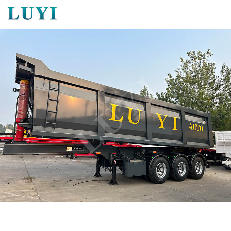 Adaptado precisamente às condições de trabalho africanas! O semirreboque basculante retangular preto de Lu Yi foi entregue com sucesso na Costa do Marfim, facilitando o transporte eficiente de materiais a granel